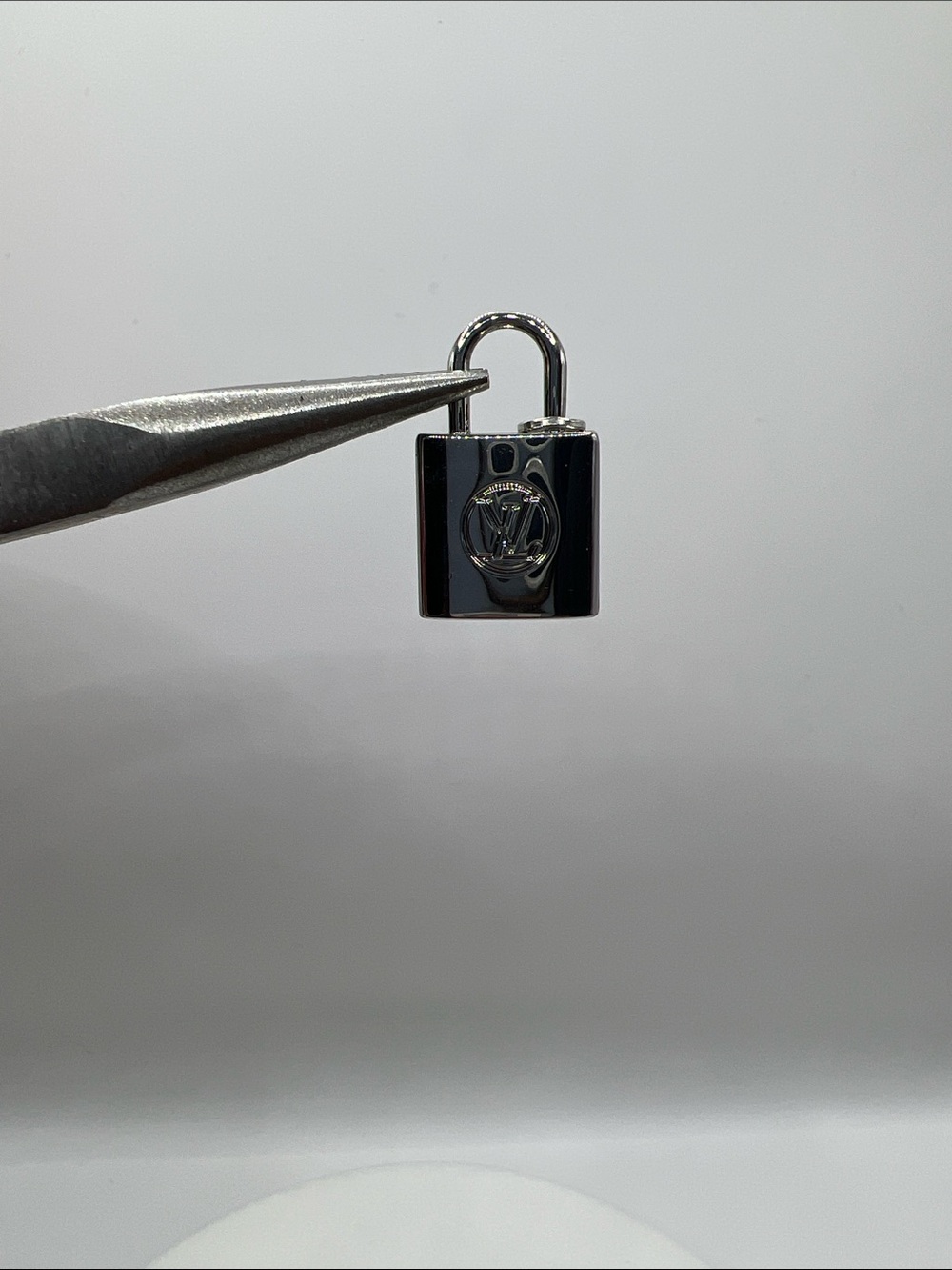 1411. Polished Silver Padlock Upcycled Charm.